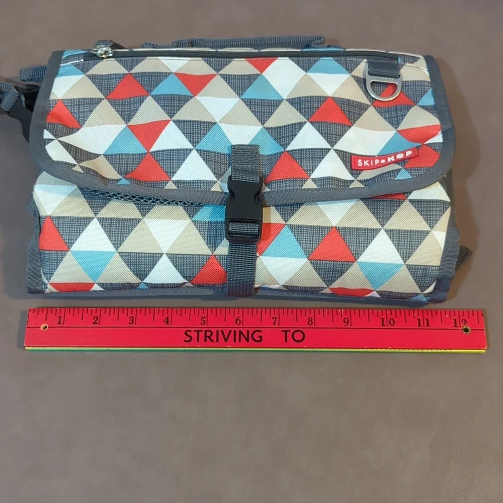 Skip Hop Pronto Baby Changing Station Portable Wristlet Triangle pattern